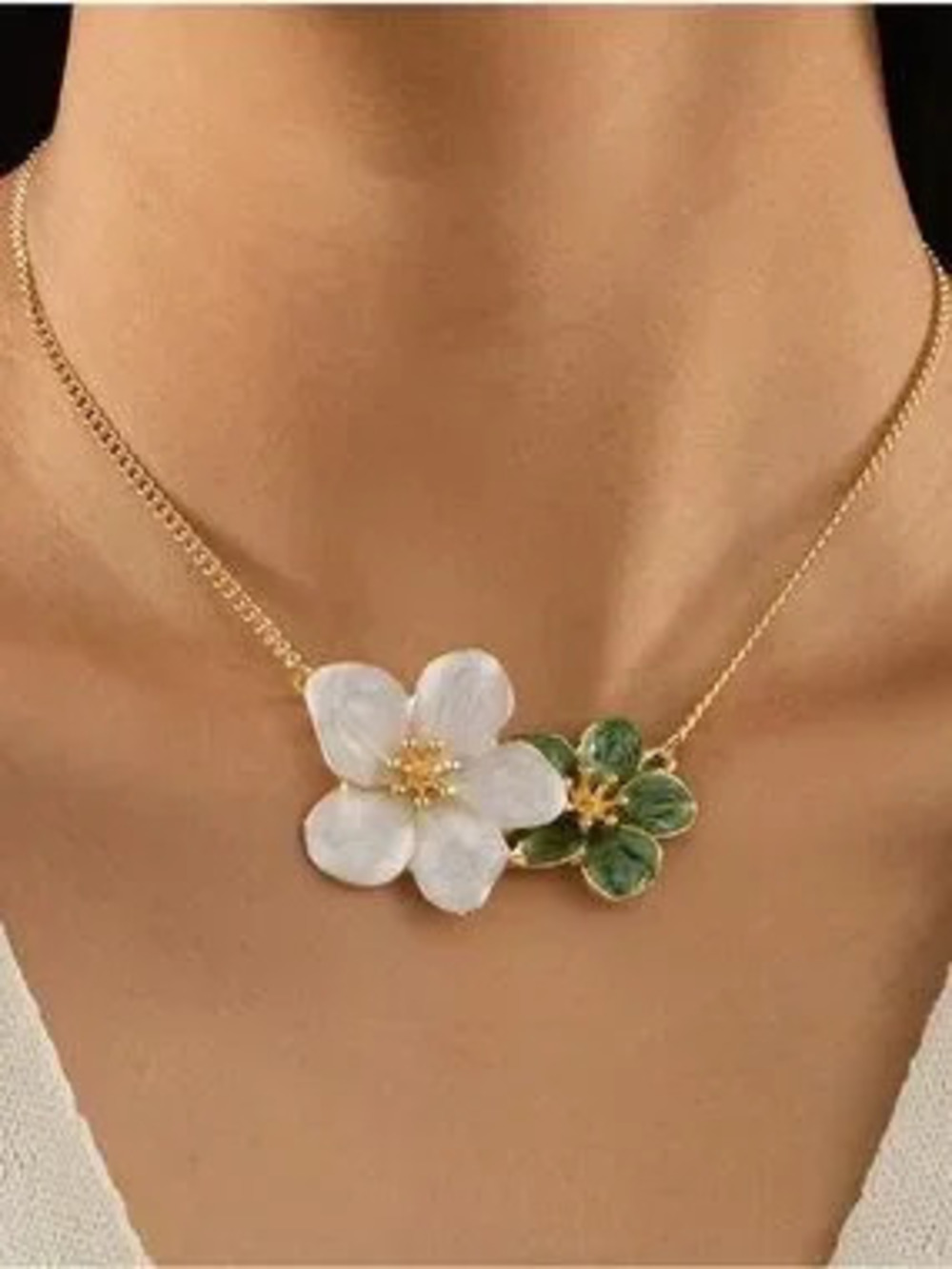 Anthropologie Gold Floral Necklace with White and Green Enamel Flowers